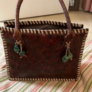 Vintage bares tooled leather purse in brown